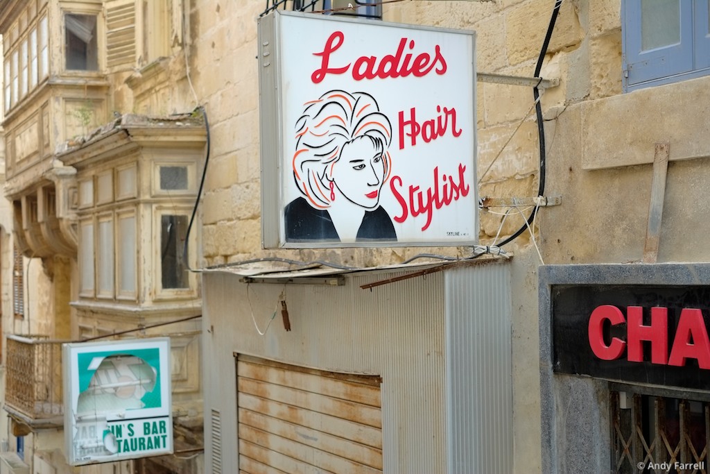 sign for a ladies’ hair stylist