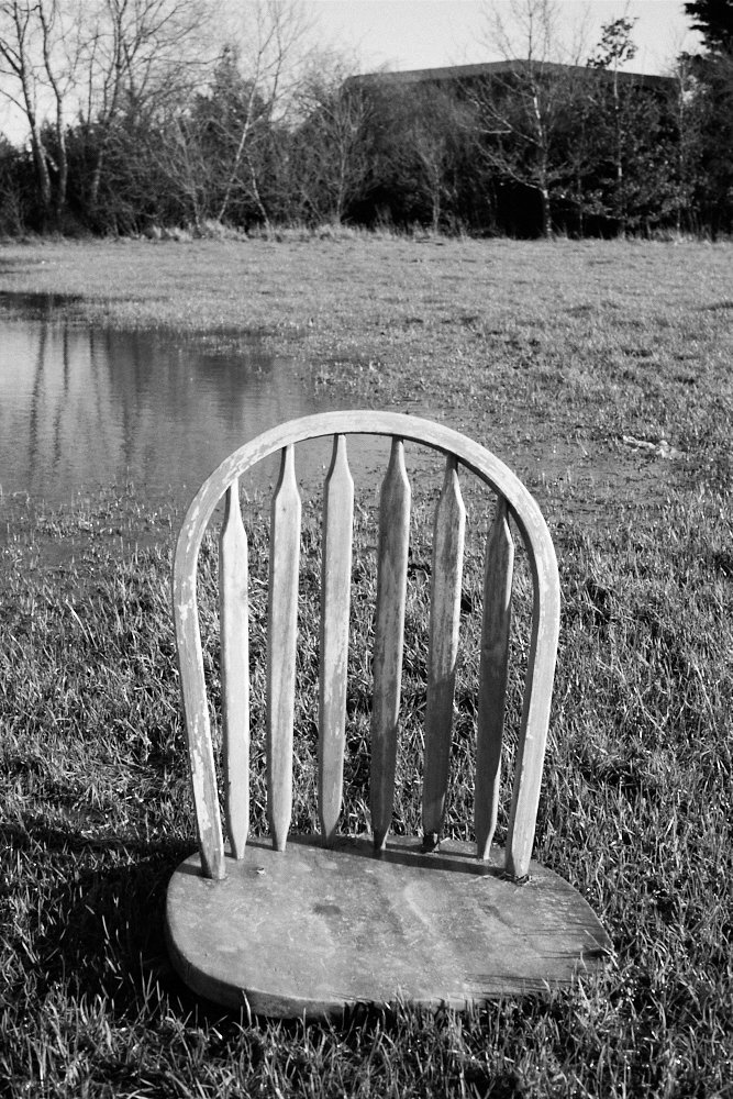 chair in a flooded field
