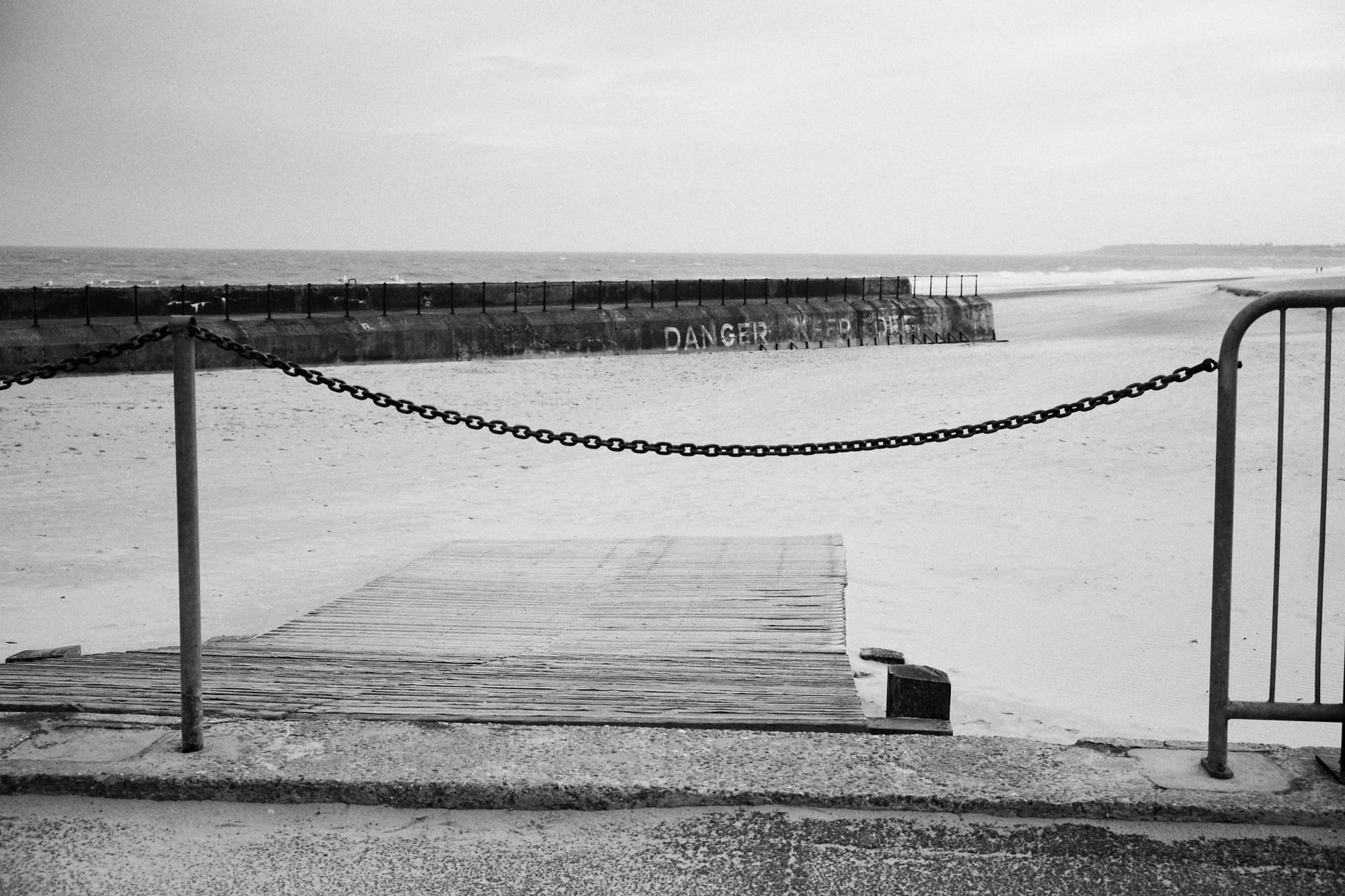 chain across ramp to the beach