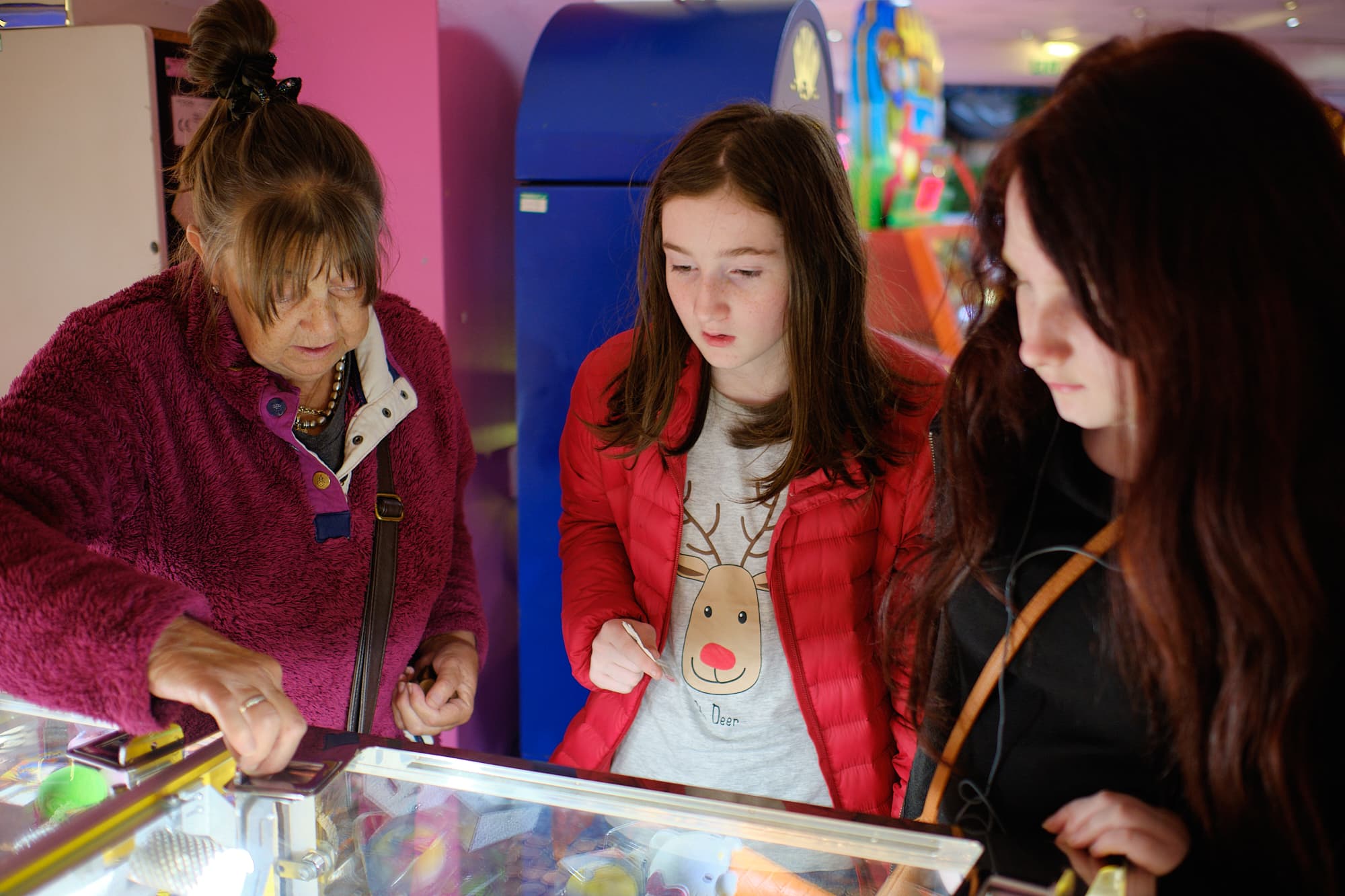 Lynne, Izzy and Gabby in the local arcade