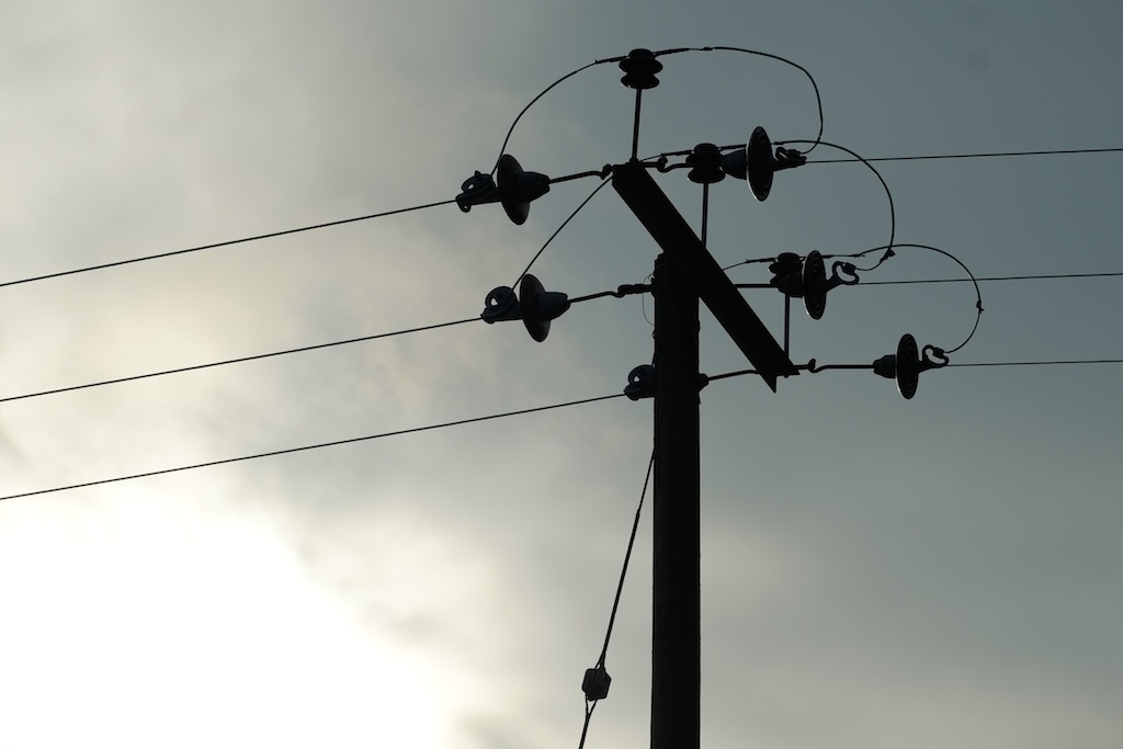 telegraph pole, lit from “below”