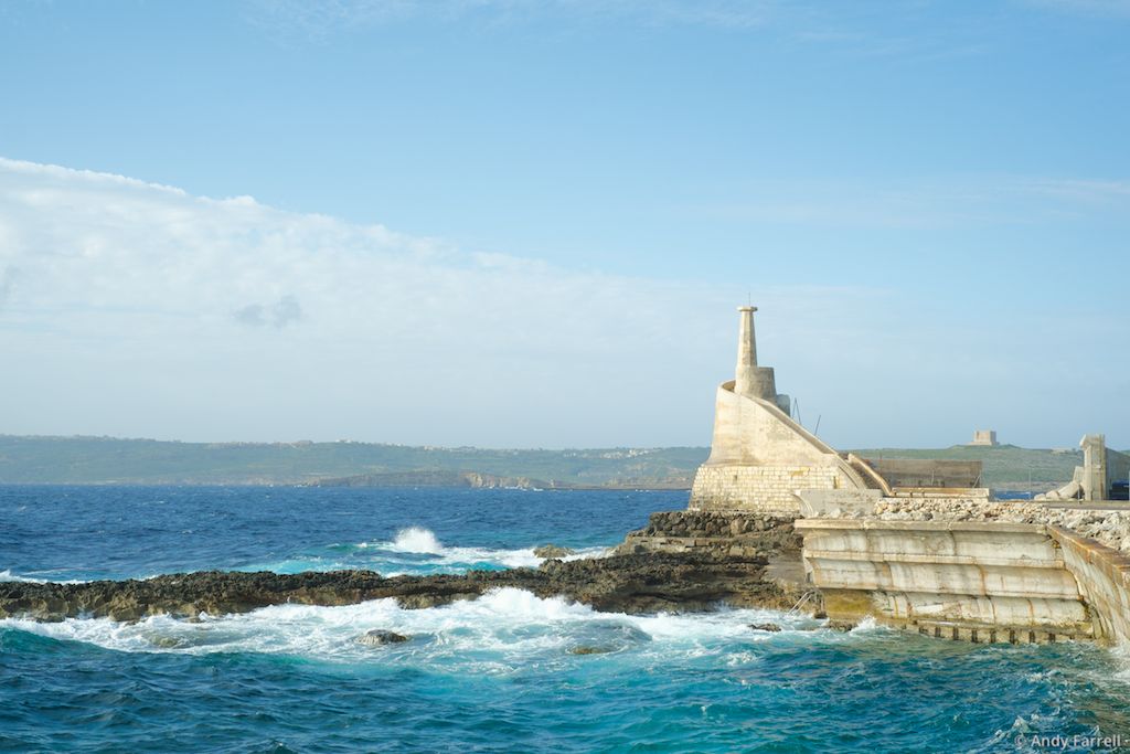 wide view of Ċirkewwa lighthouse