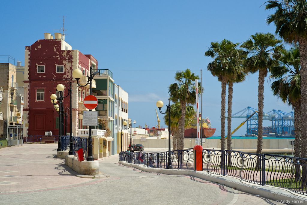 red-painted flats by the beach