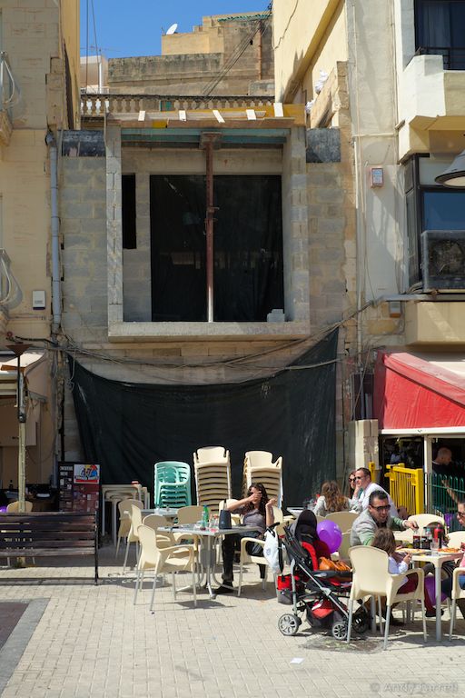 seats outside a café in Marsaskala