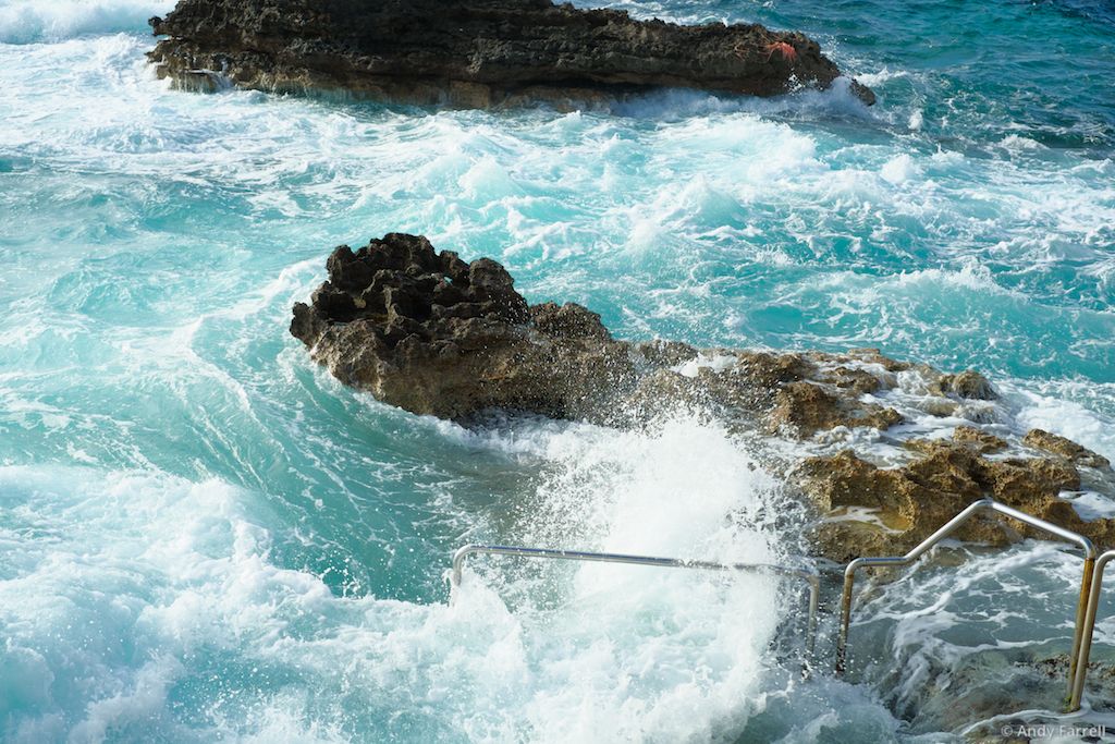 sea washing over jagged rocks