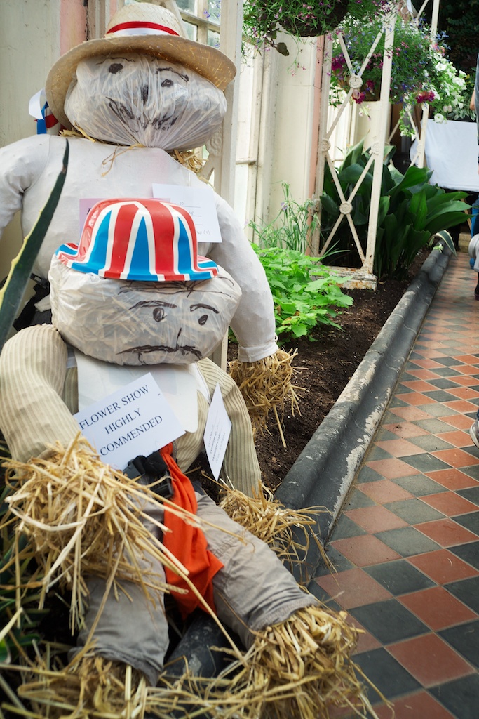 Scarecrows in the flower show building