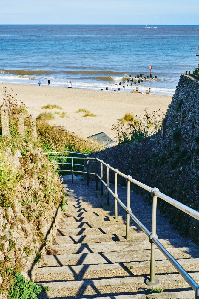 steps descending to the beach and sea