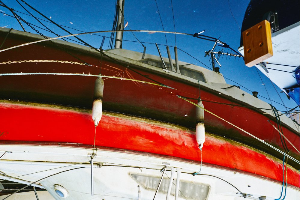 inverted reflection of a boat