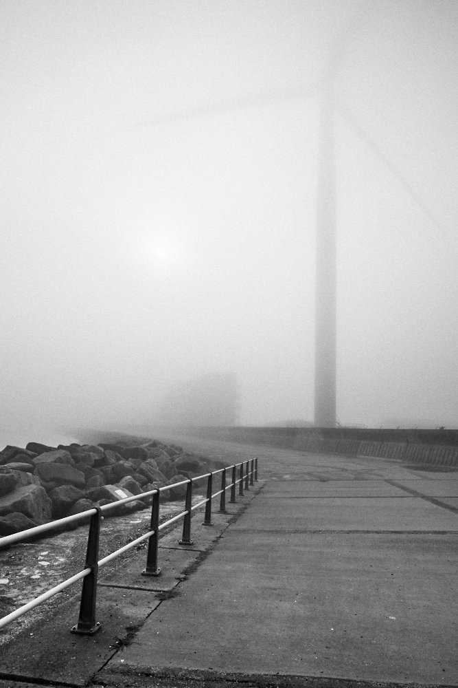 foggy wind turbine