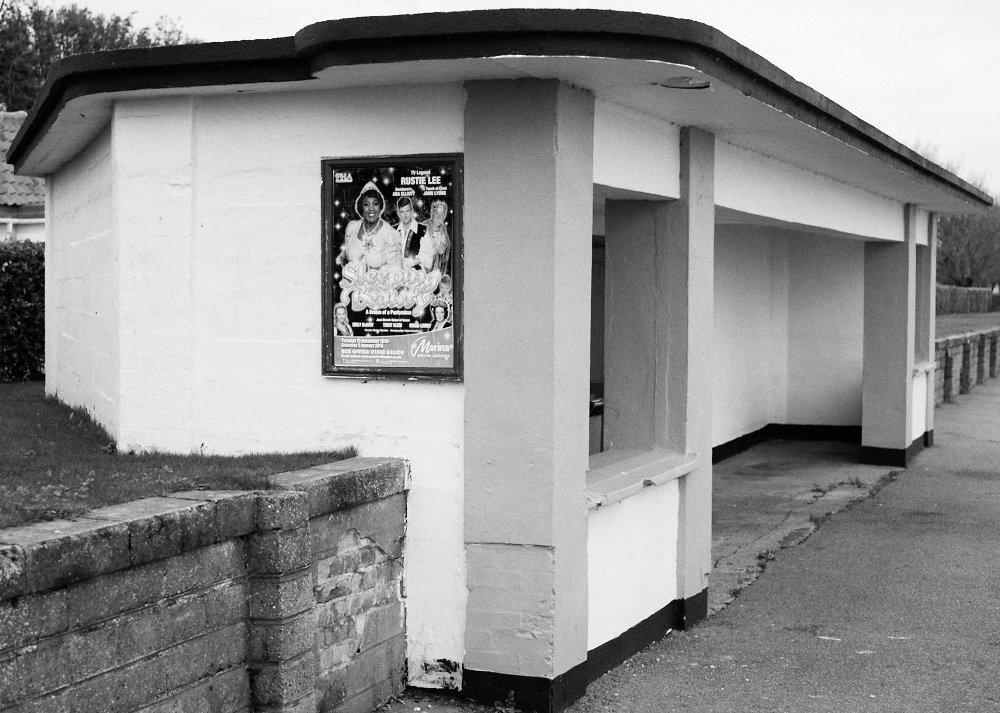 poster on beach shelter