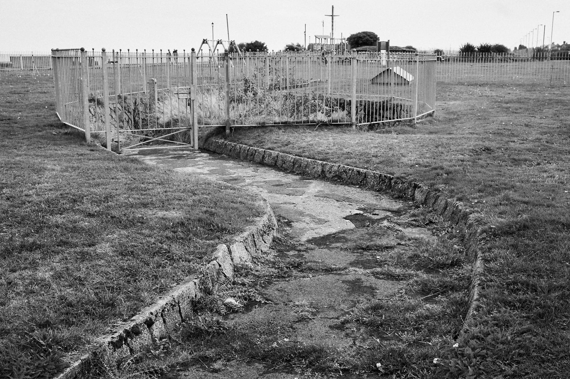 dilapidated path to underground shed