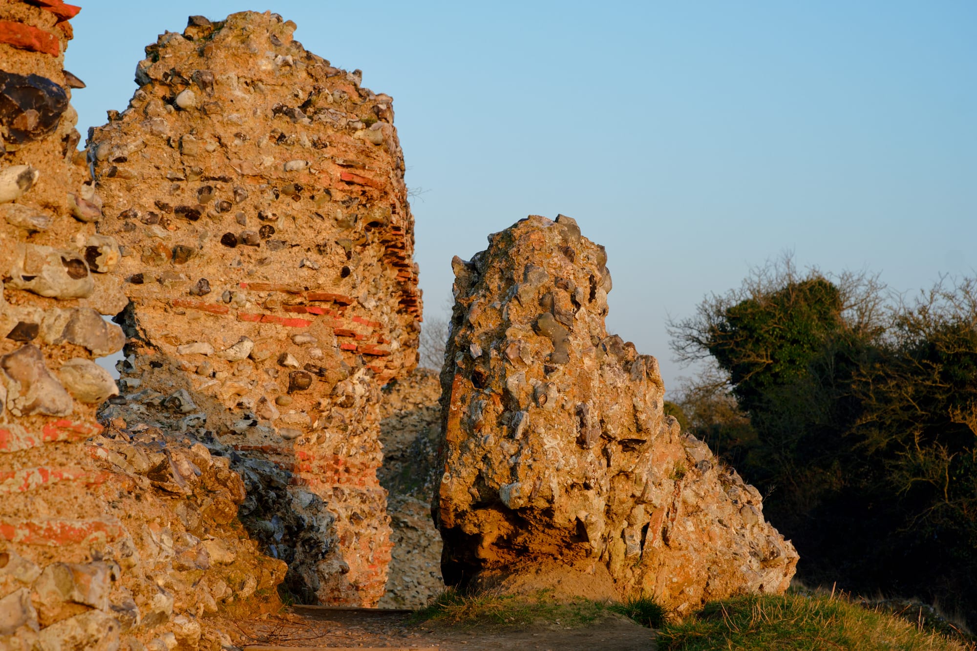 wall sections lit orange by the setting sun