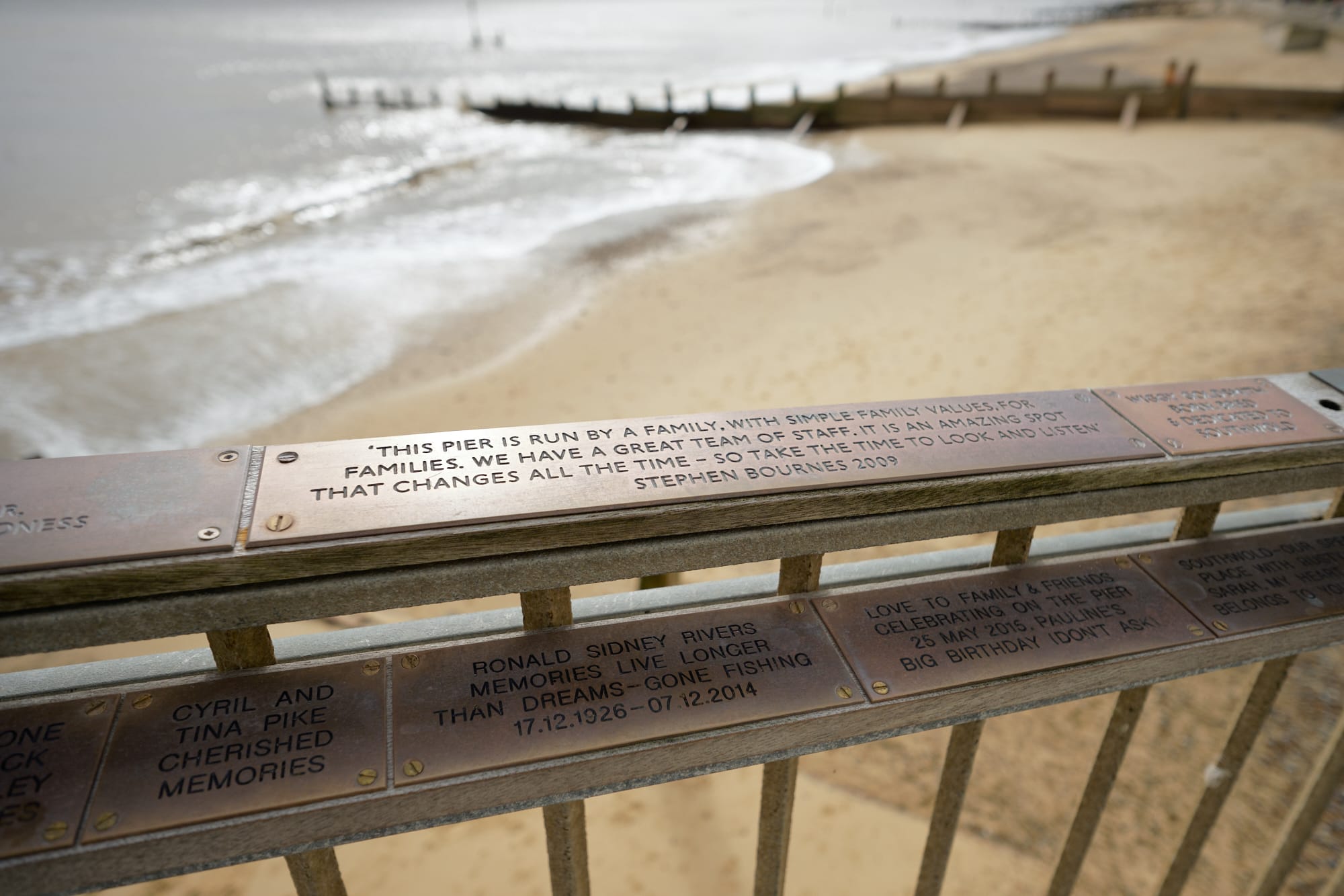 memorial plaques on the pier