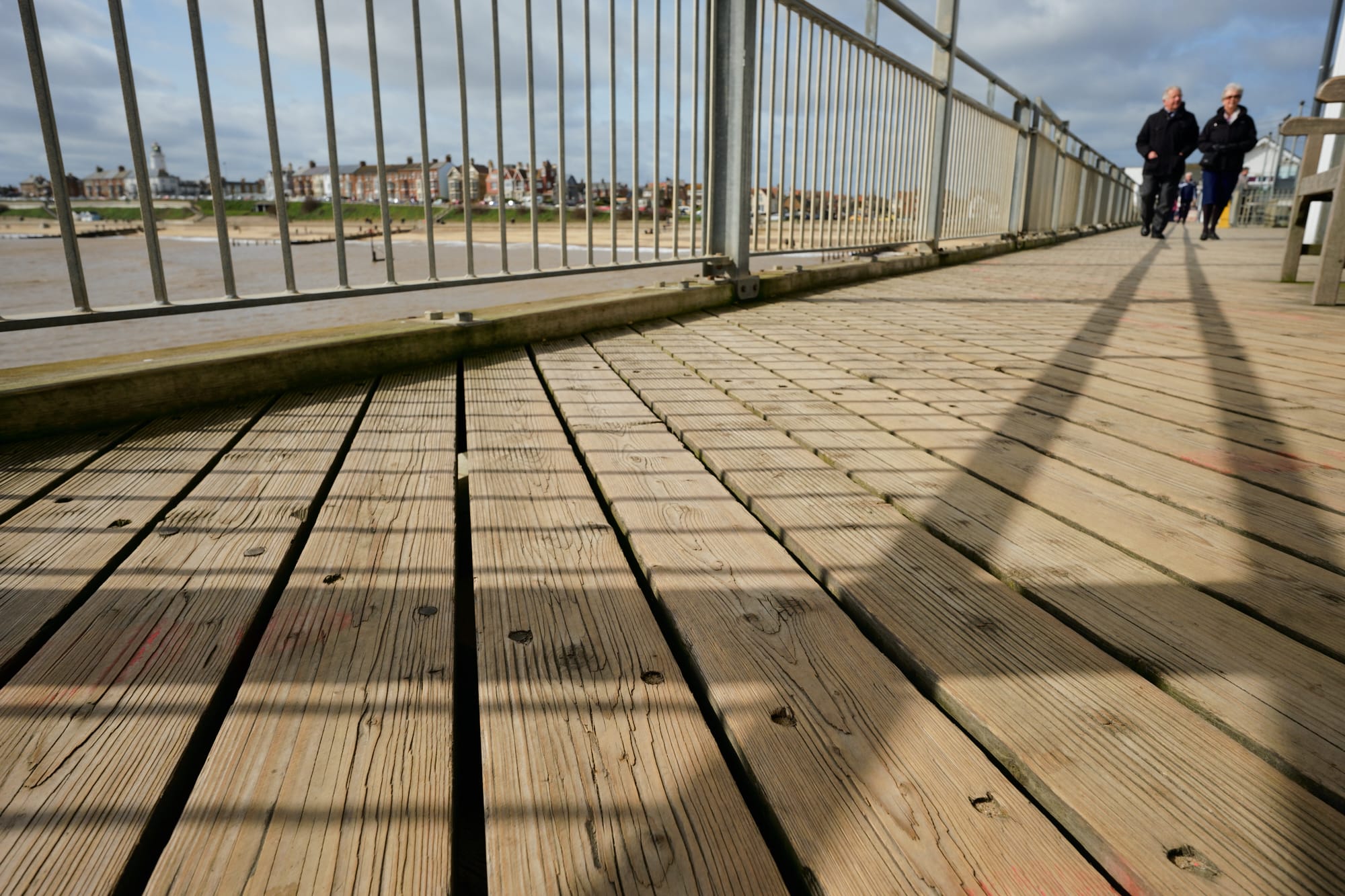 railing shadows on the pier