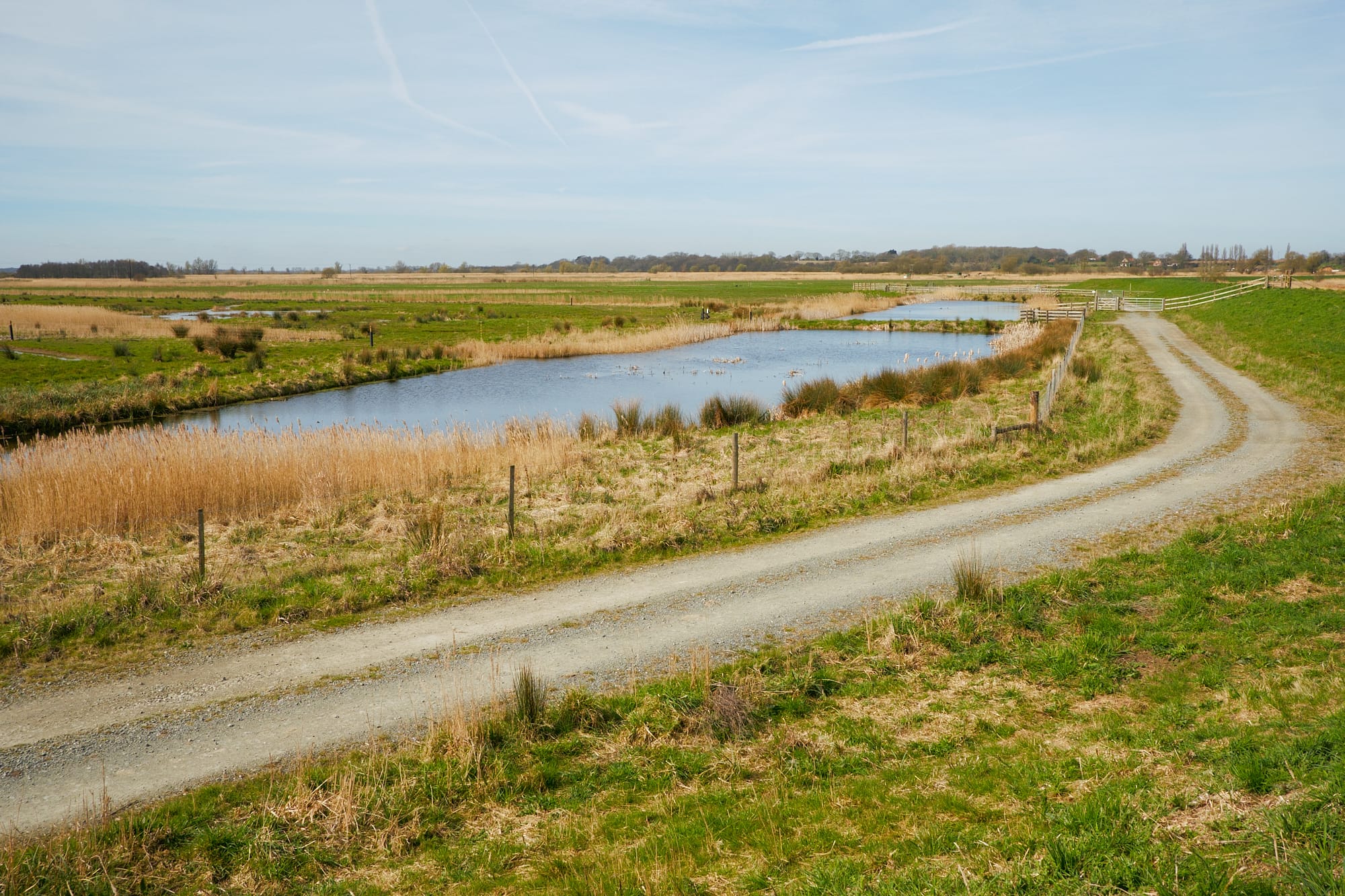 gravel road around water