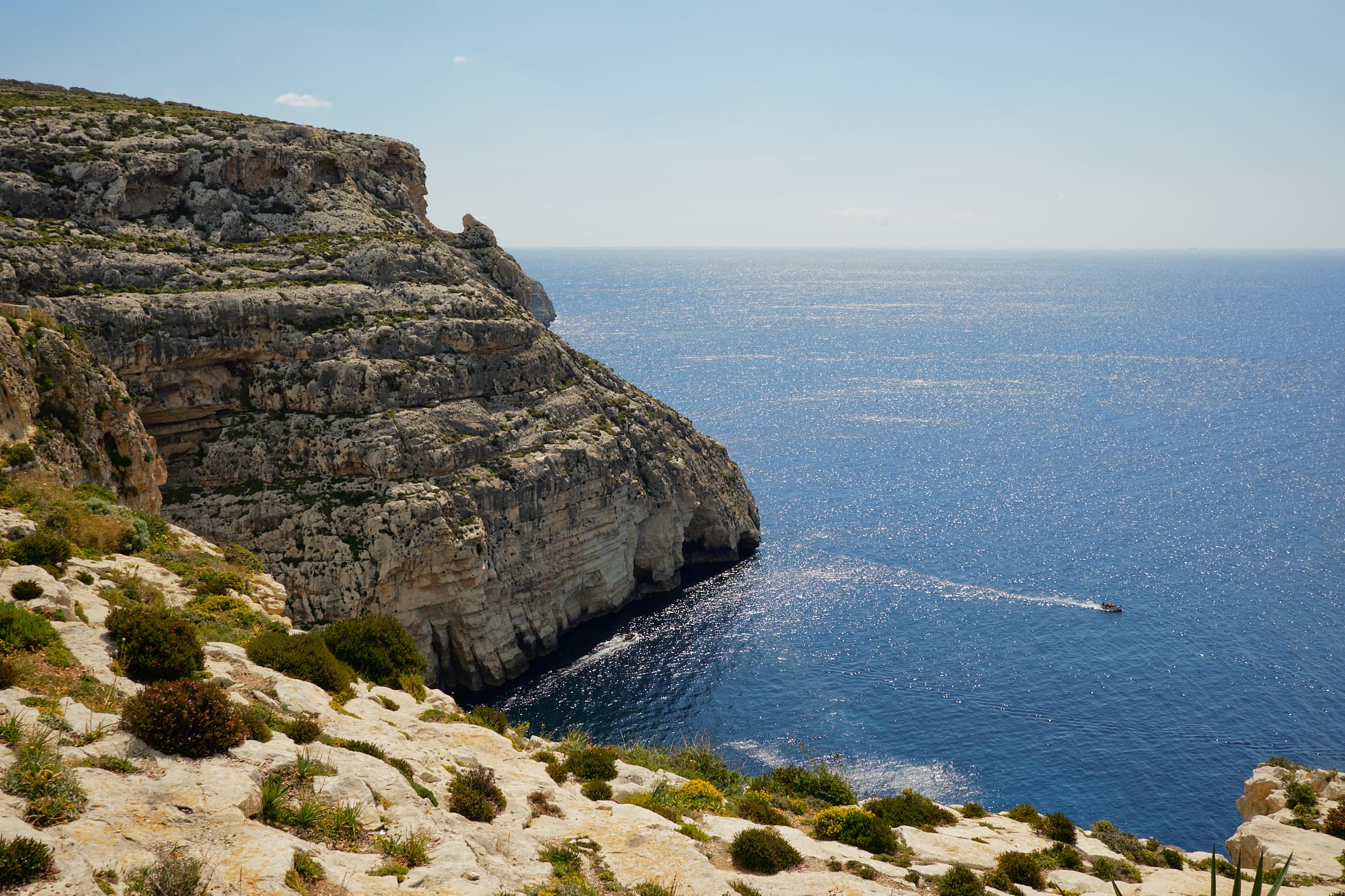 overlooking a boat heading back from the Blue Grotto