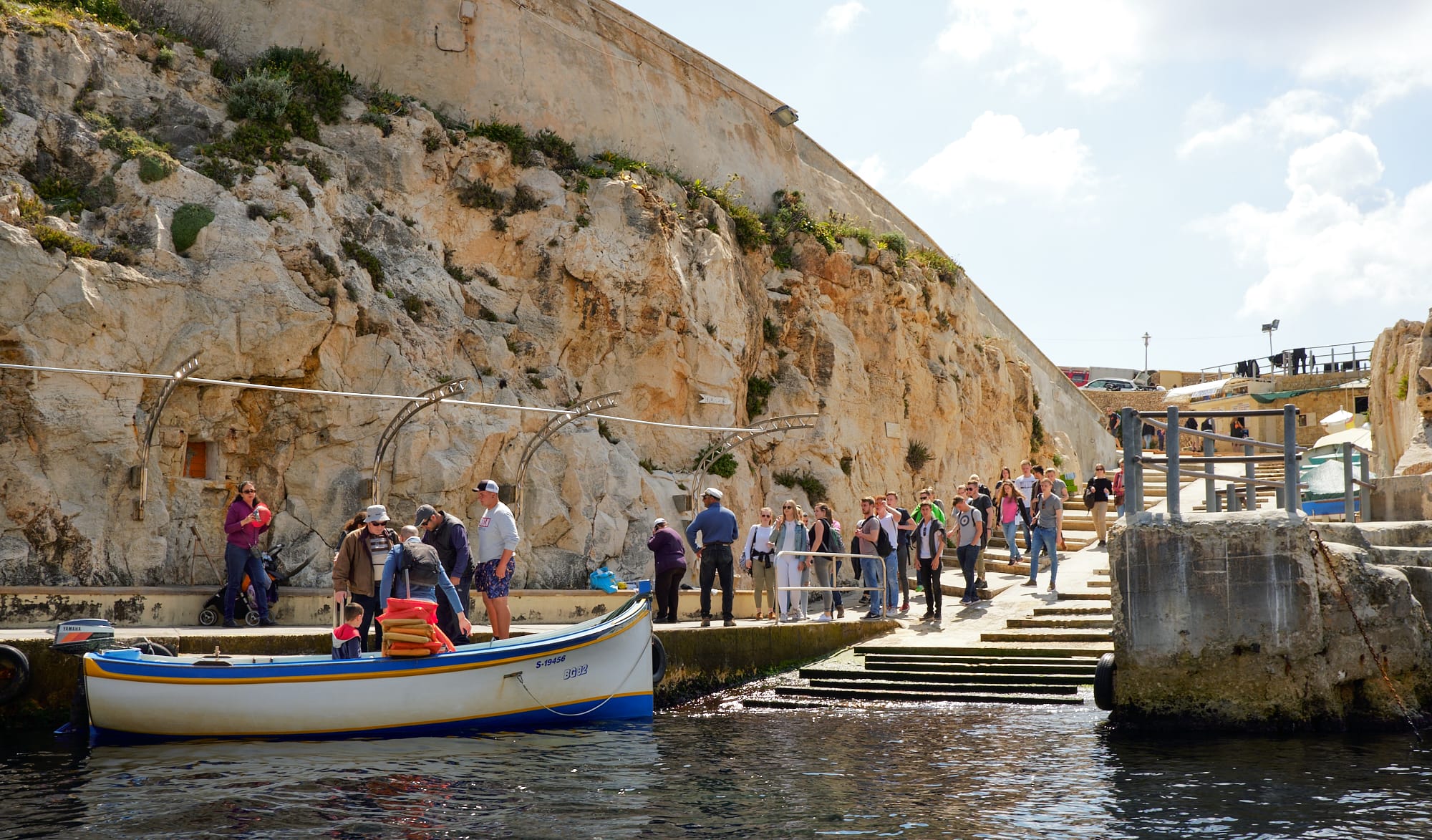 the small harbour where tourists get on and off the boats