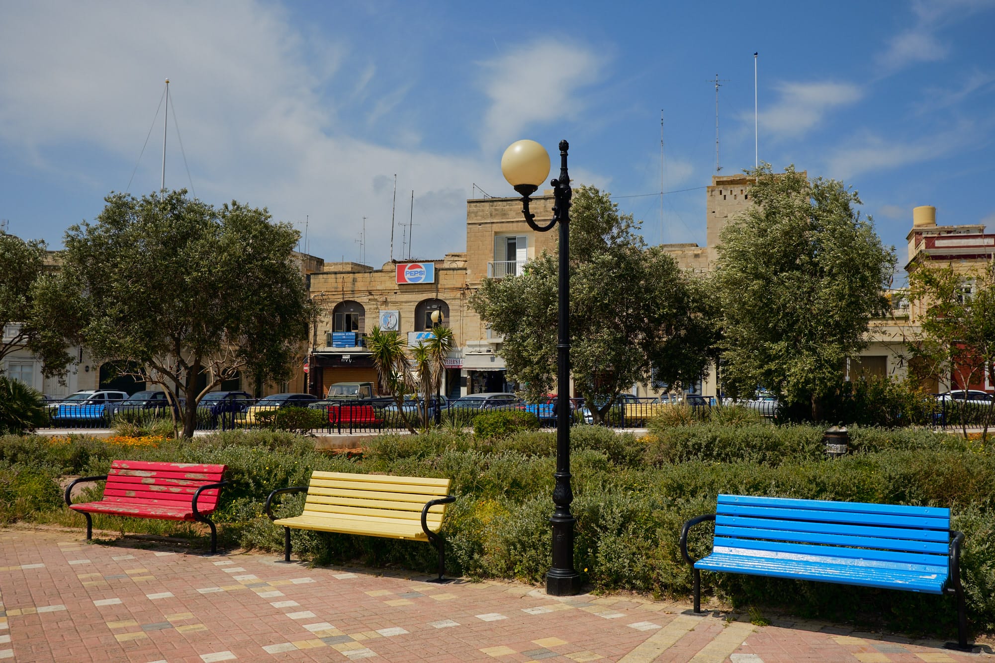 red, yellow and blue benches