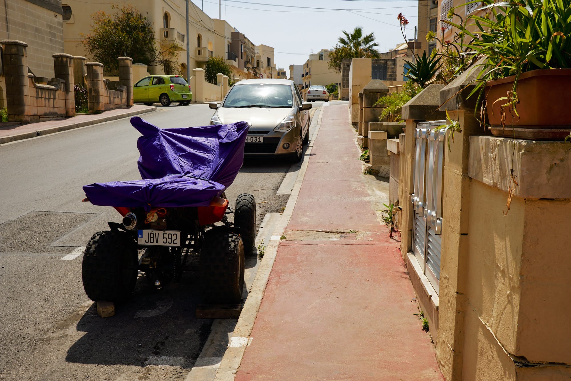 quad bike with purple cover