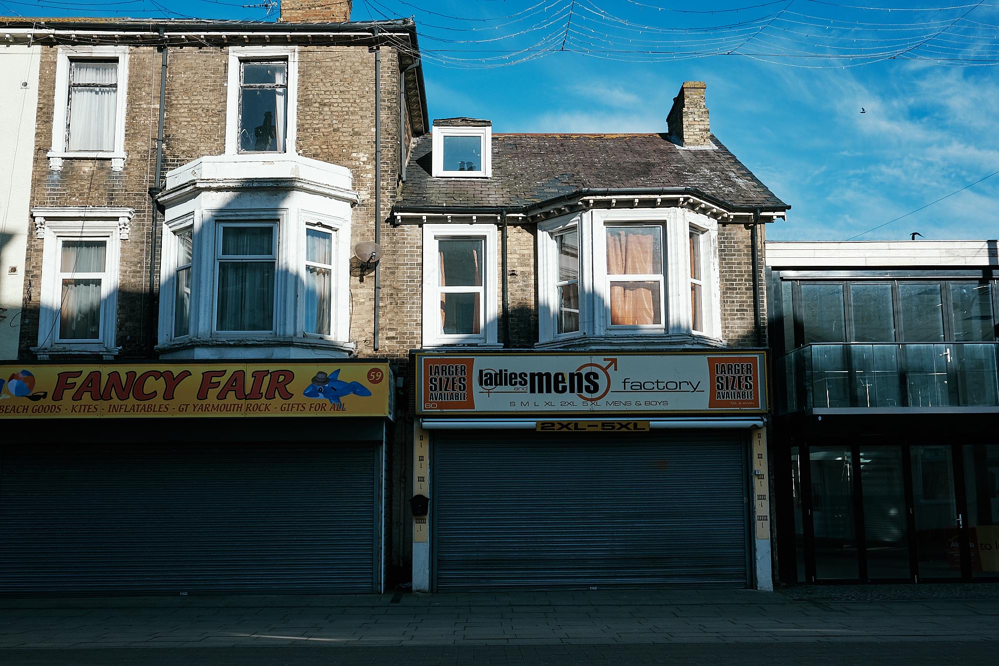 closed shops in shadow