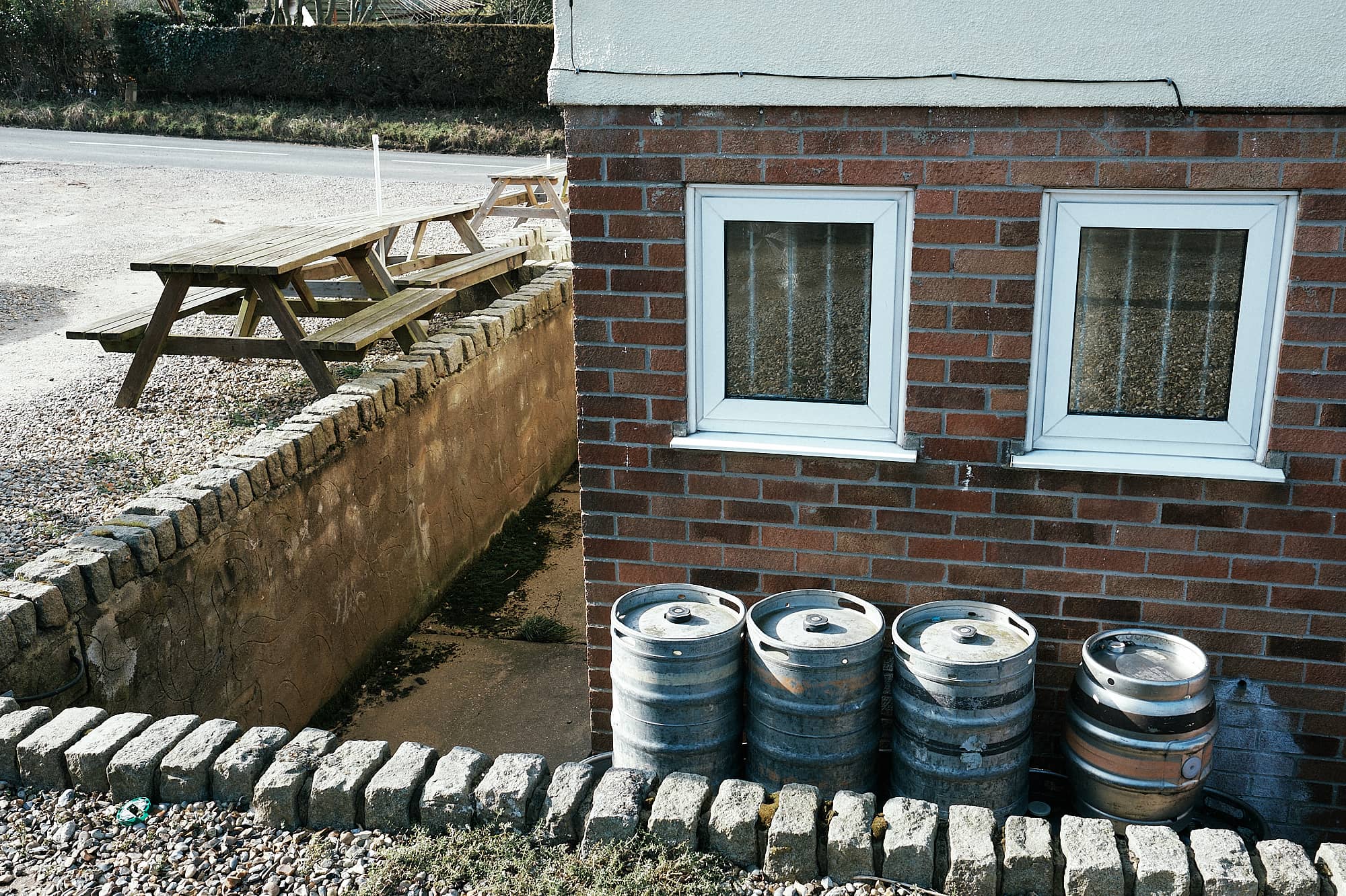 kegs behind a pub