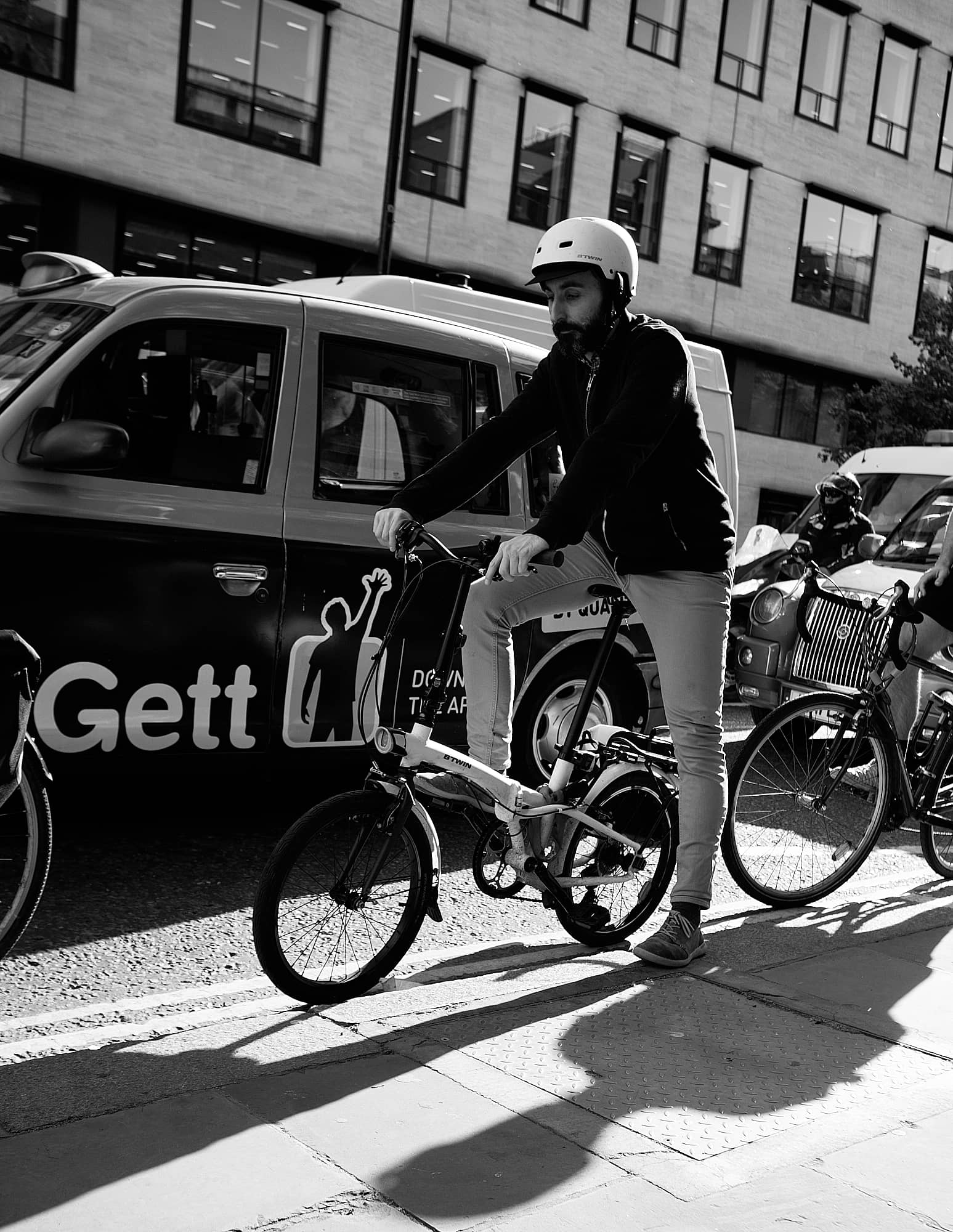 man on a foldable bike