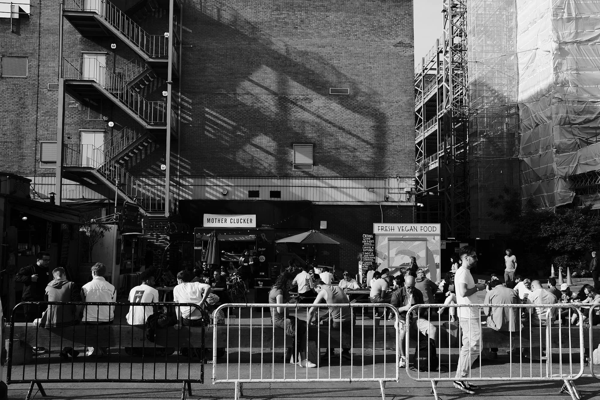 people outside a some restaurants