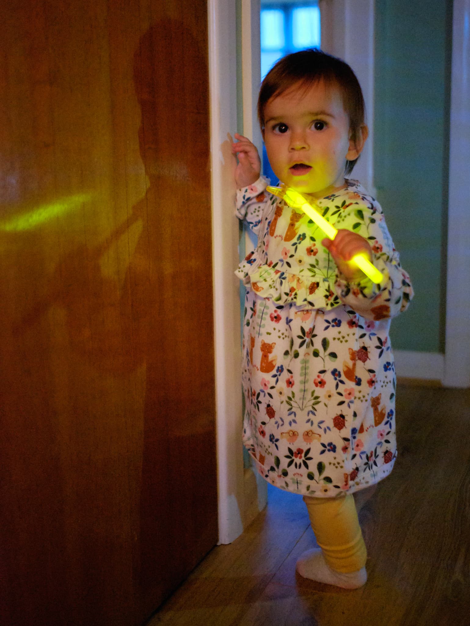 Em using a glowstick to explore my parents’ house