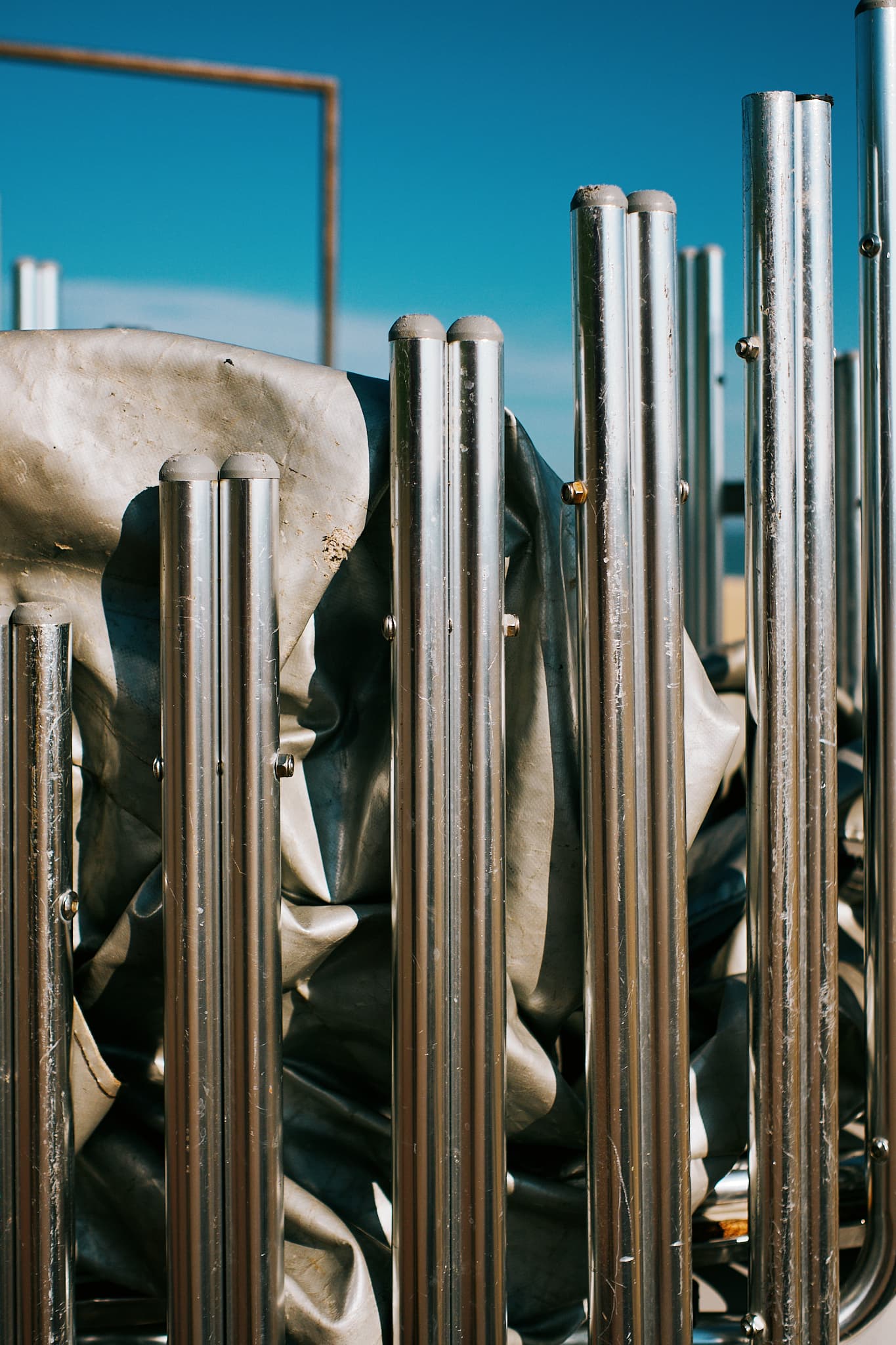 low sun on shiny metal pipes