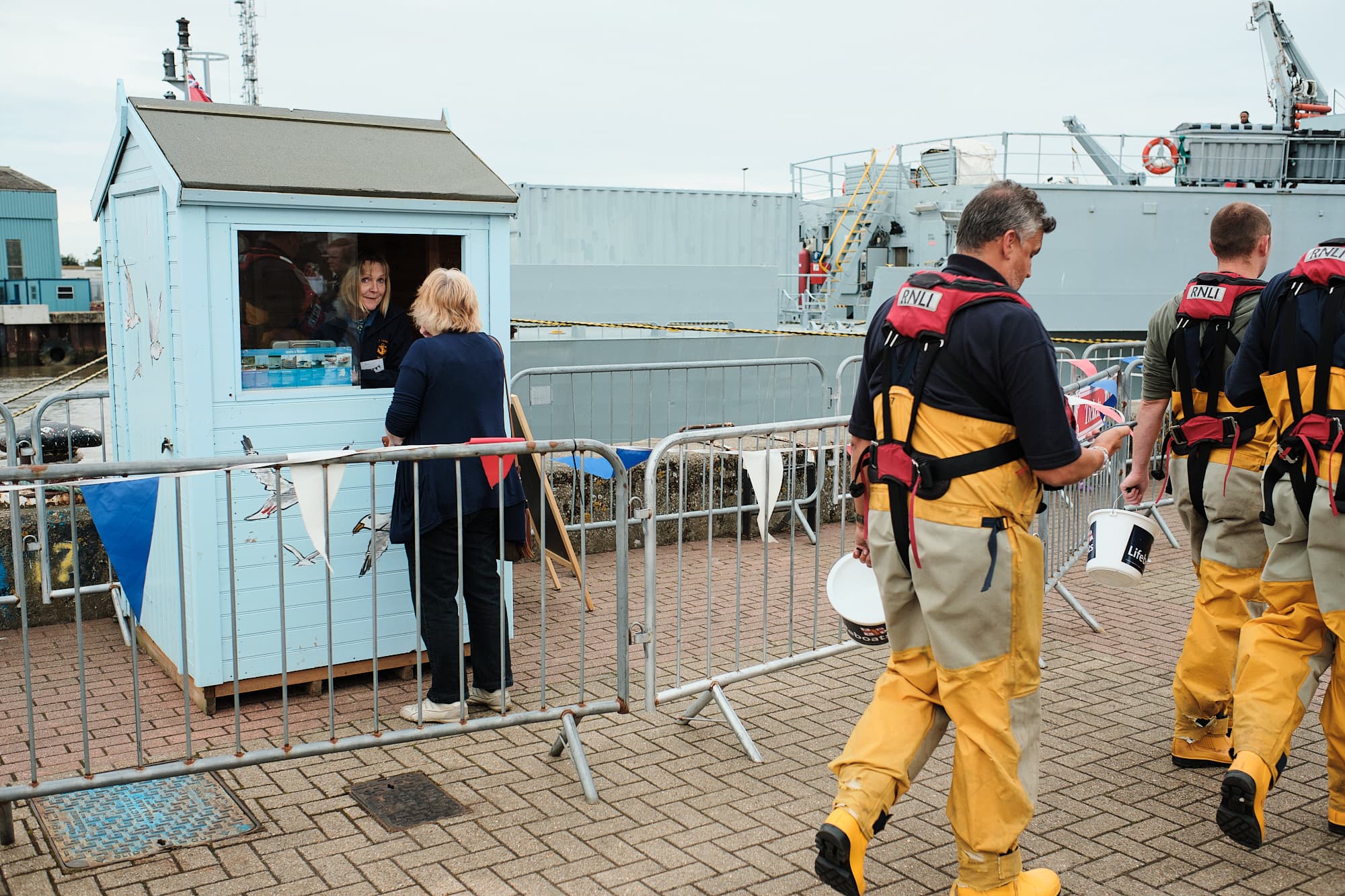 RNLI crew and a ticket booth