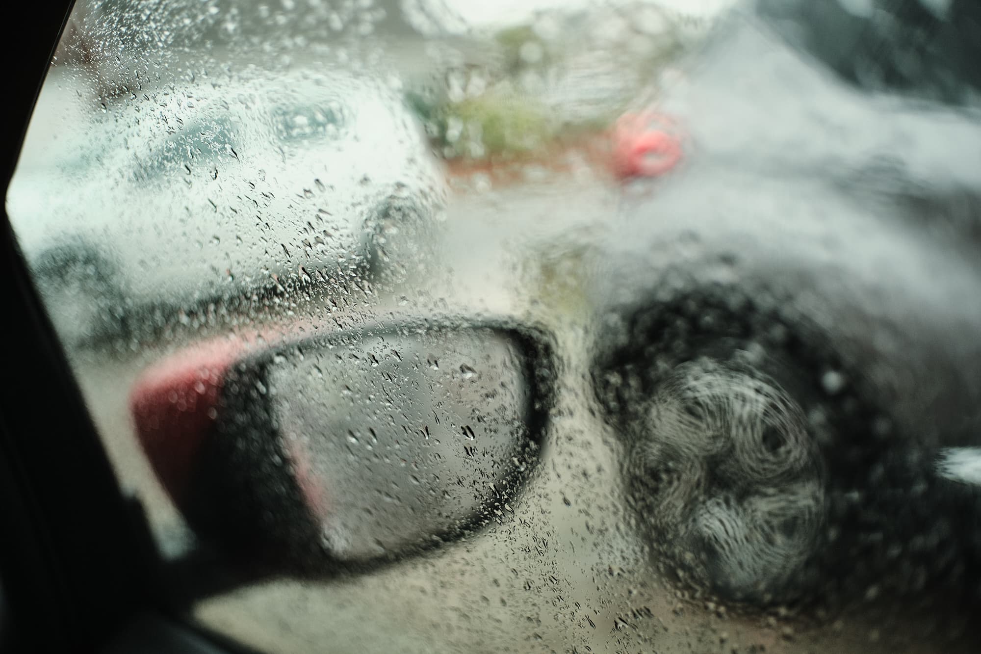 interaction of bokeh with raindrops on glass