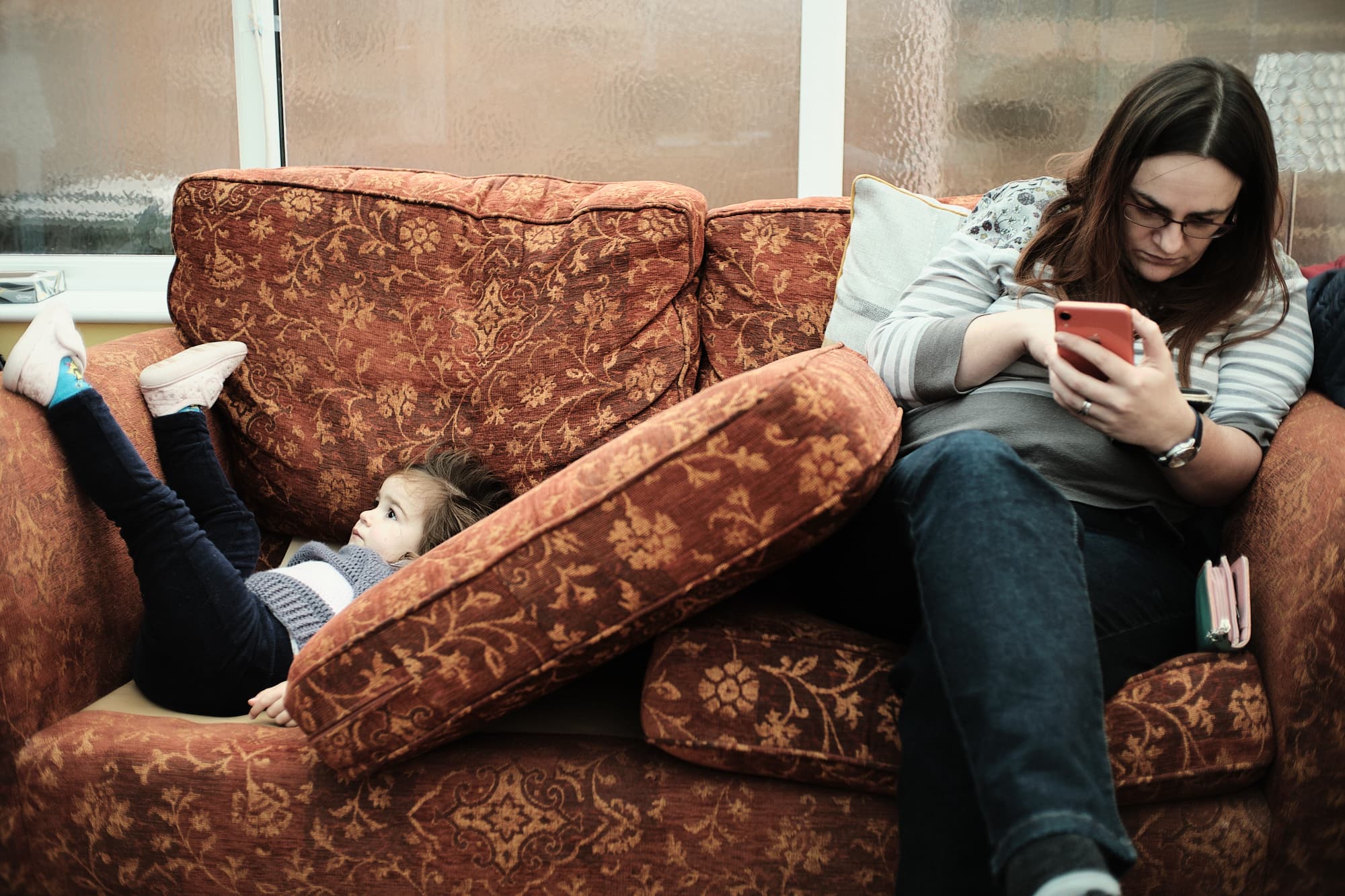 Em and Zoe on my mum’s sofa