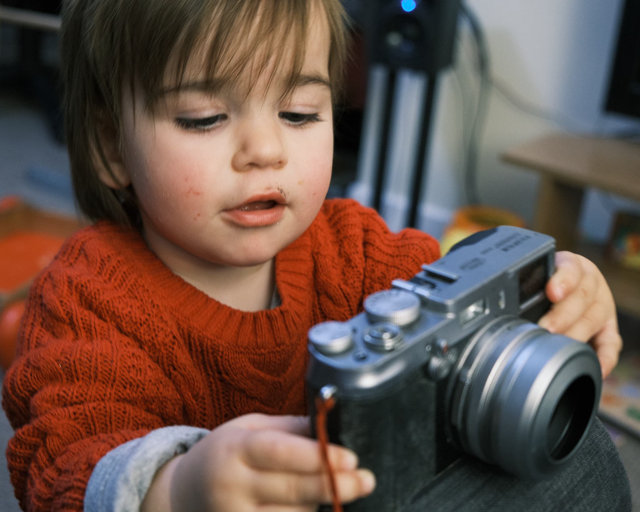 Emily holding my old Fuji X100