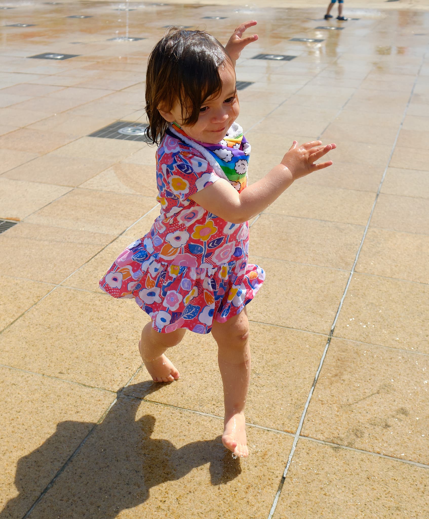 Emily playing in the fountains