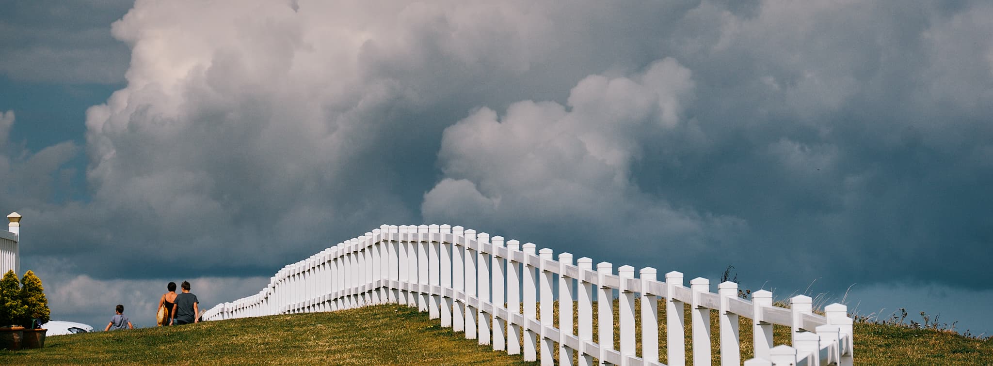 fence along the cliffs above Hopton beach