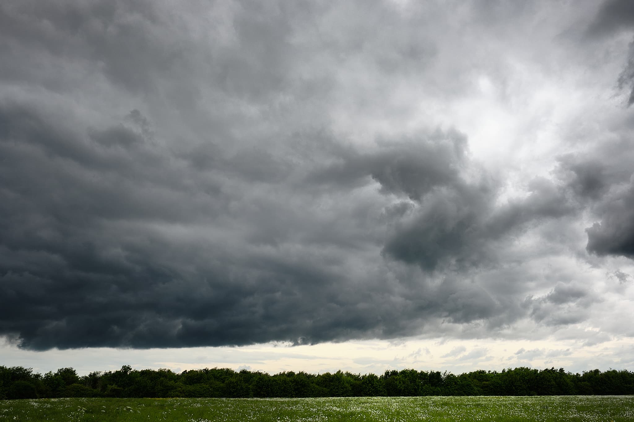 dramatic clouds over a field