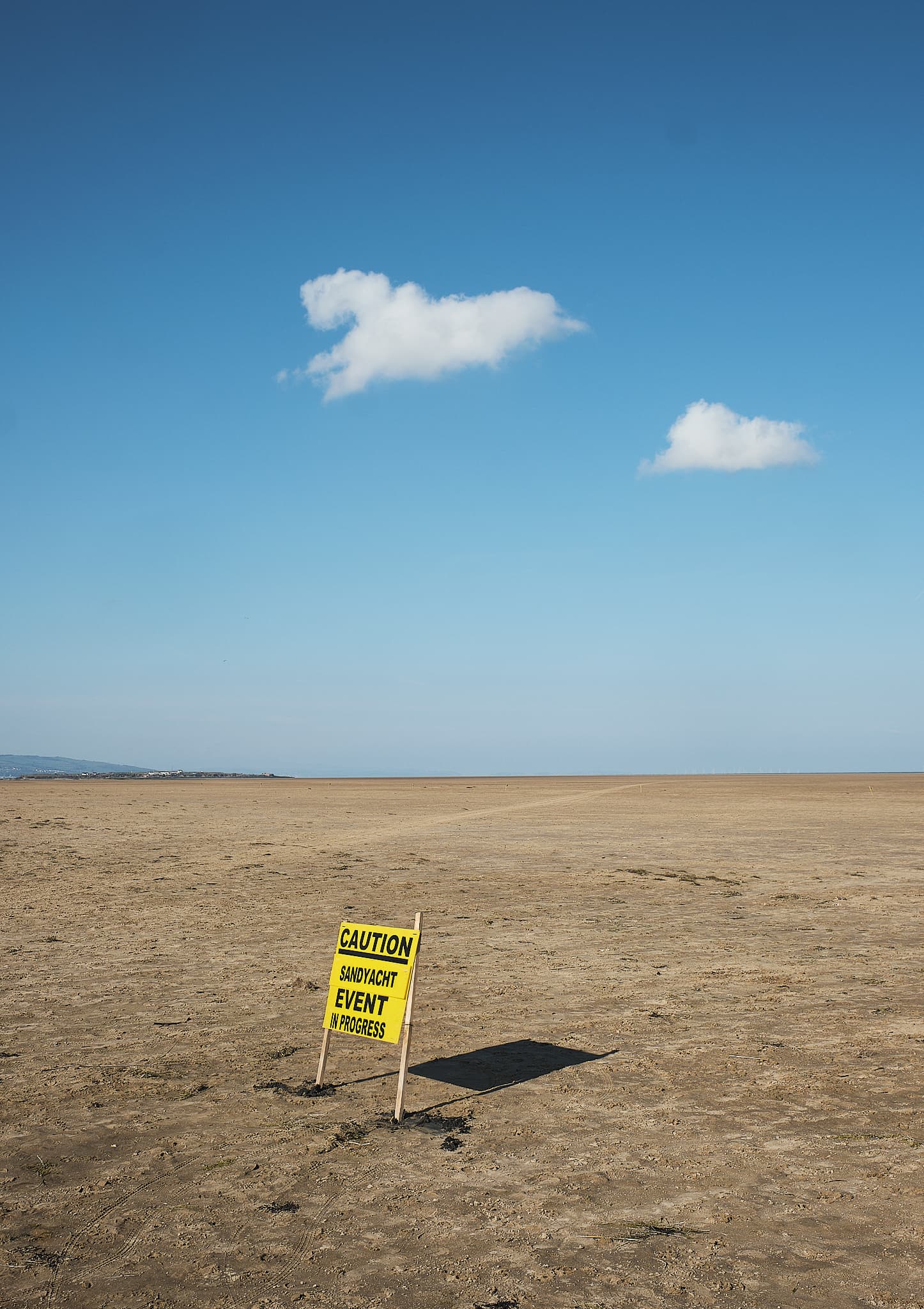 event caution sign on Hoylake beach