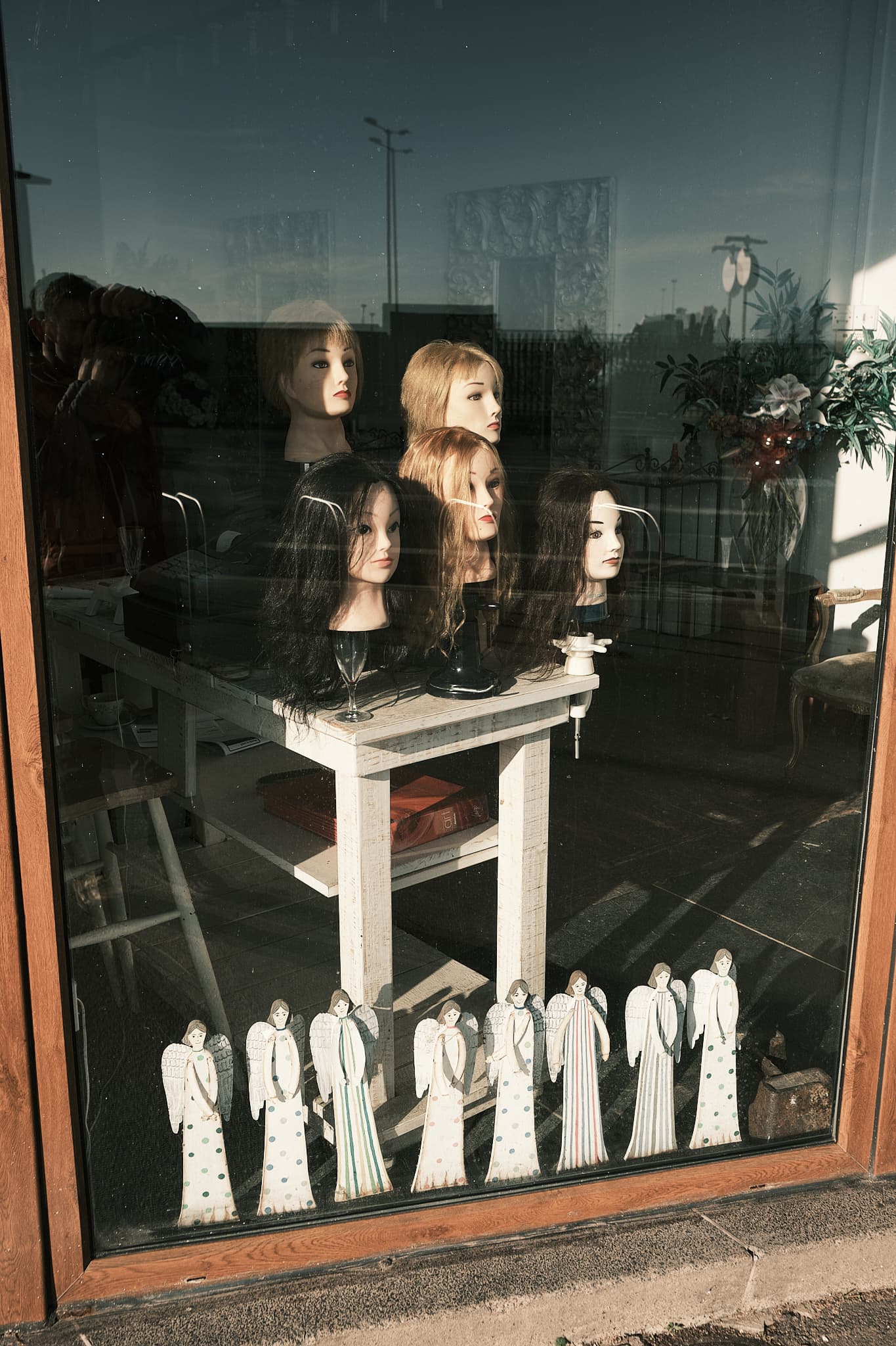 doll heads in a shop window