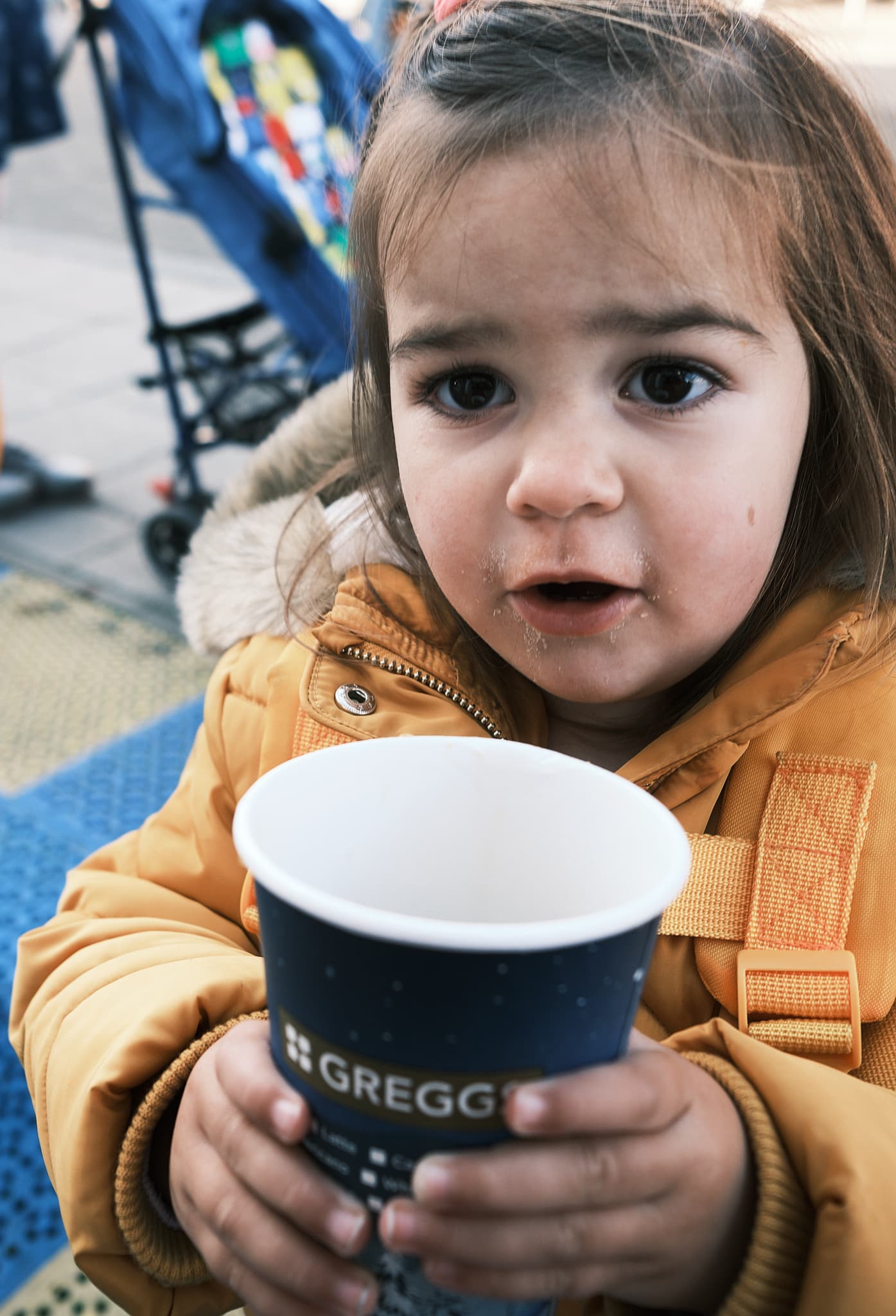 Emily enjoying the smell of coffee