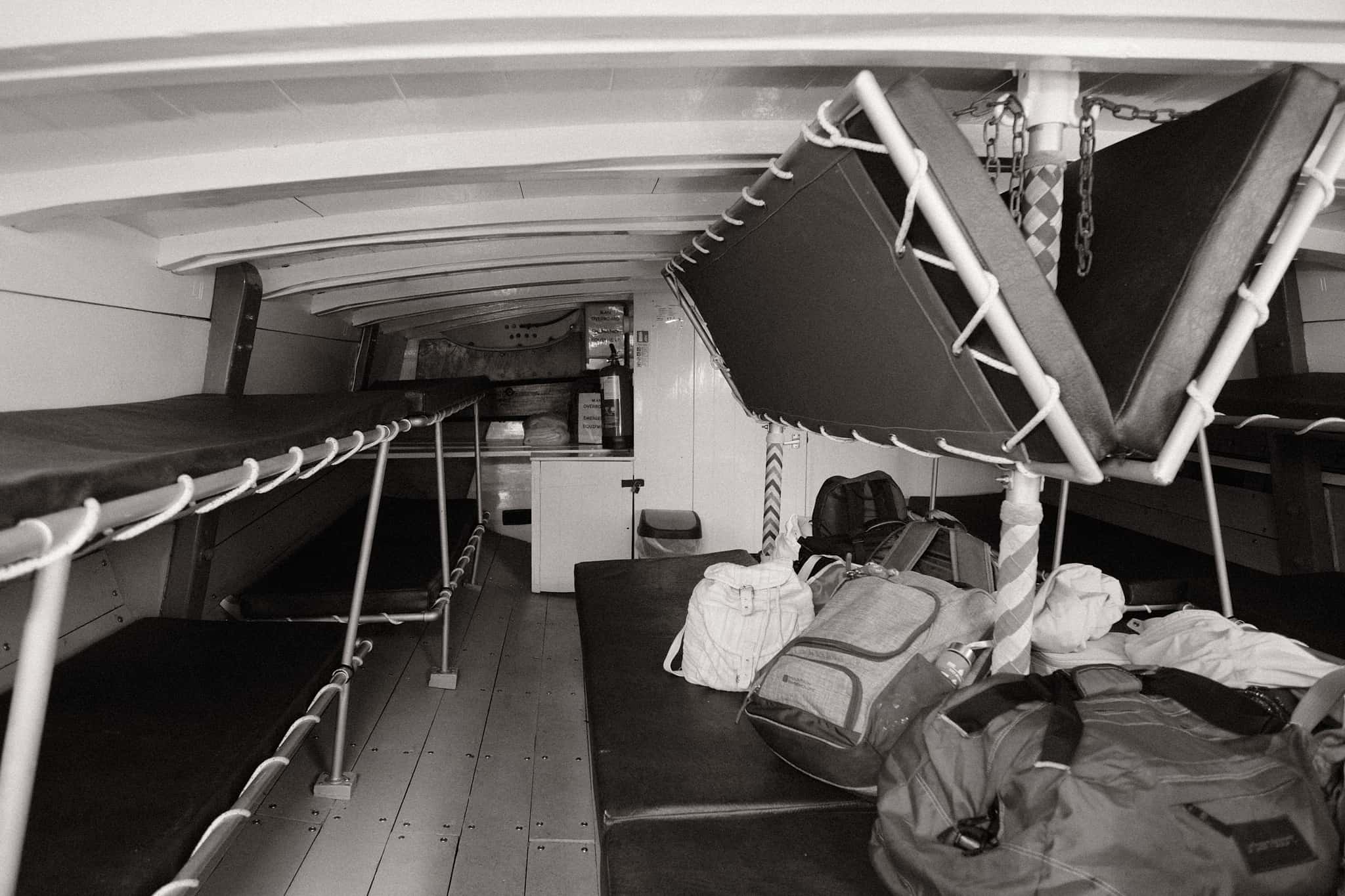 Inside the wherry, facing the stern.