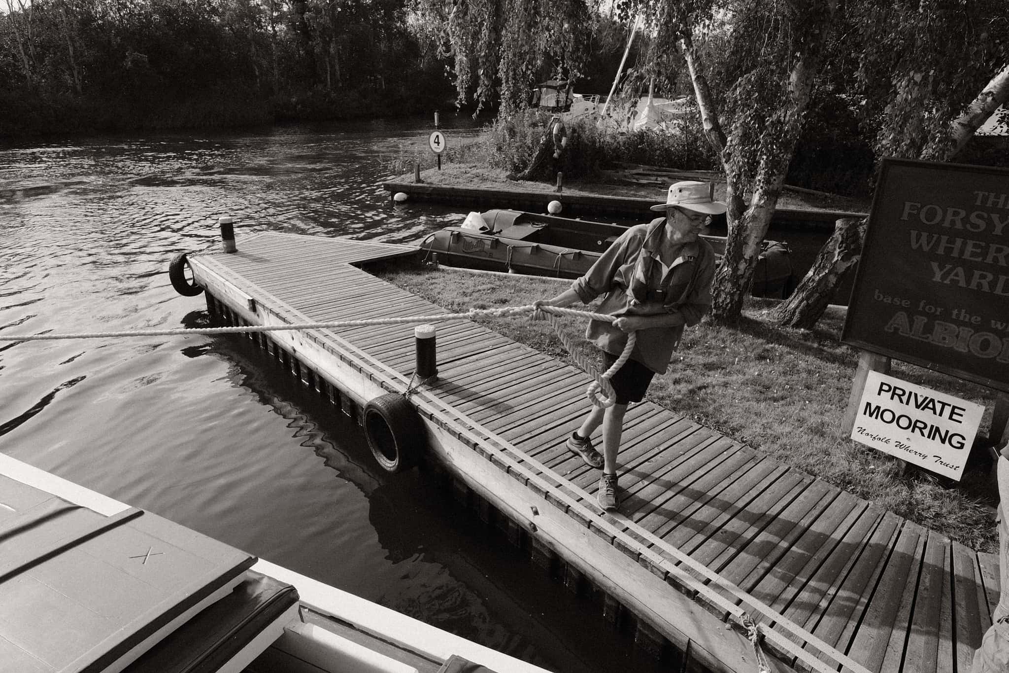 Pulling the wherry back into its storage dock.